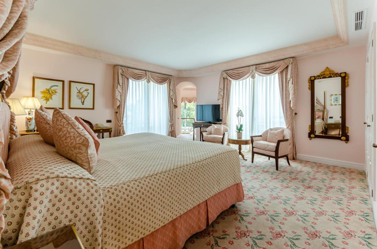 Uma cama ou camas num quarto em Olissippo Lapa Palace – The Leading Hotels of the World