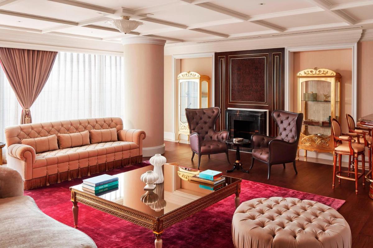 a living room with a couch and a table at The Ritz-Carlton, Pune in Pune