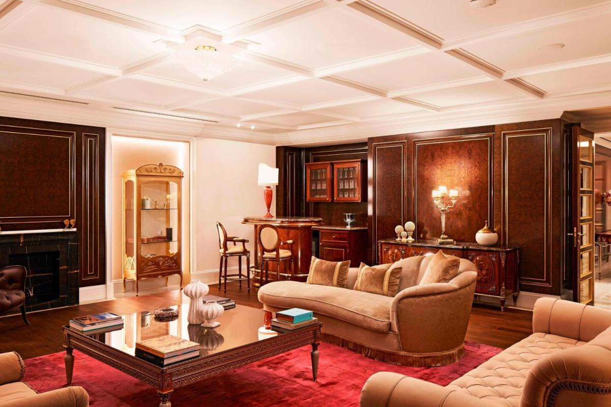 a living room with a couch and a table at The Ritz-Carlton, Pune in Pune