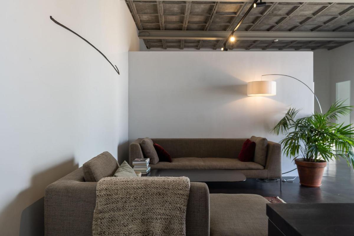 Loft van 90 m² met grote binnentuin. - Housity