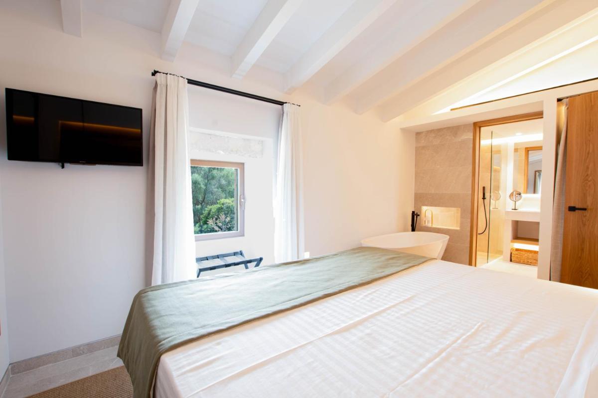 Cama o camas de una habitación en Fincahotel Treurer - Olive Grove & Grand House - Adults Only