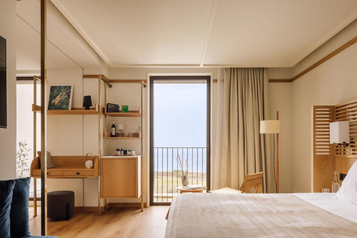 Uma cama ou camas num quarto em Aethos Ericeira