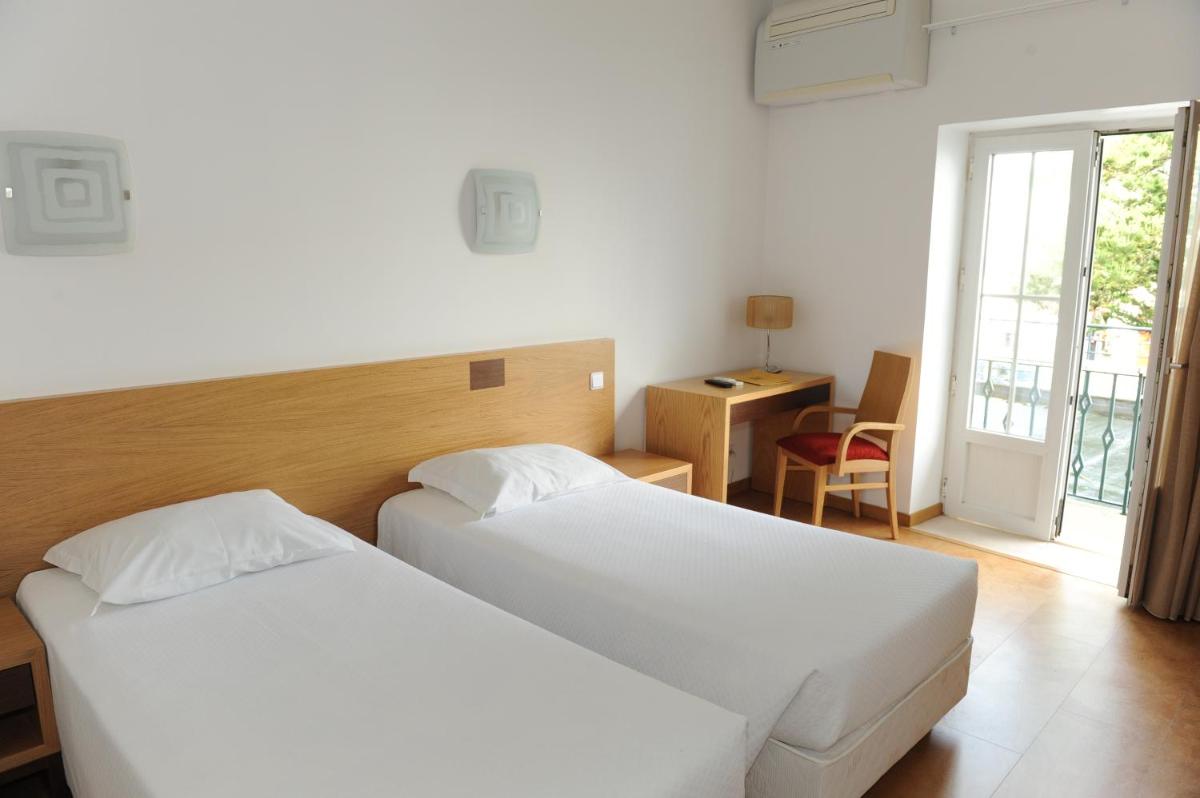 Hotel Brazão - Housity