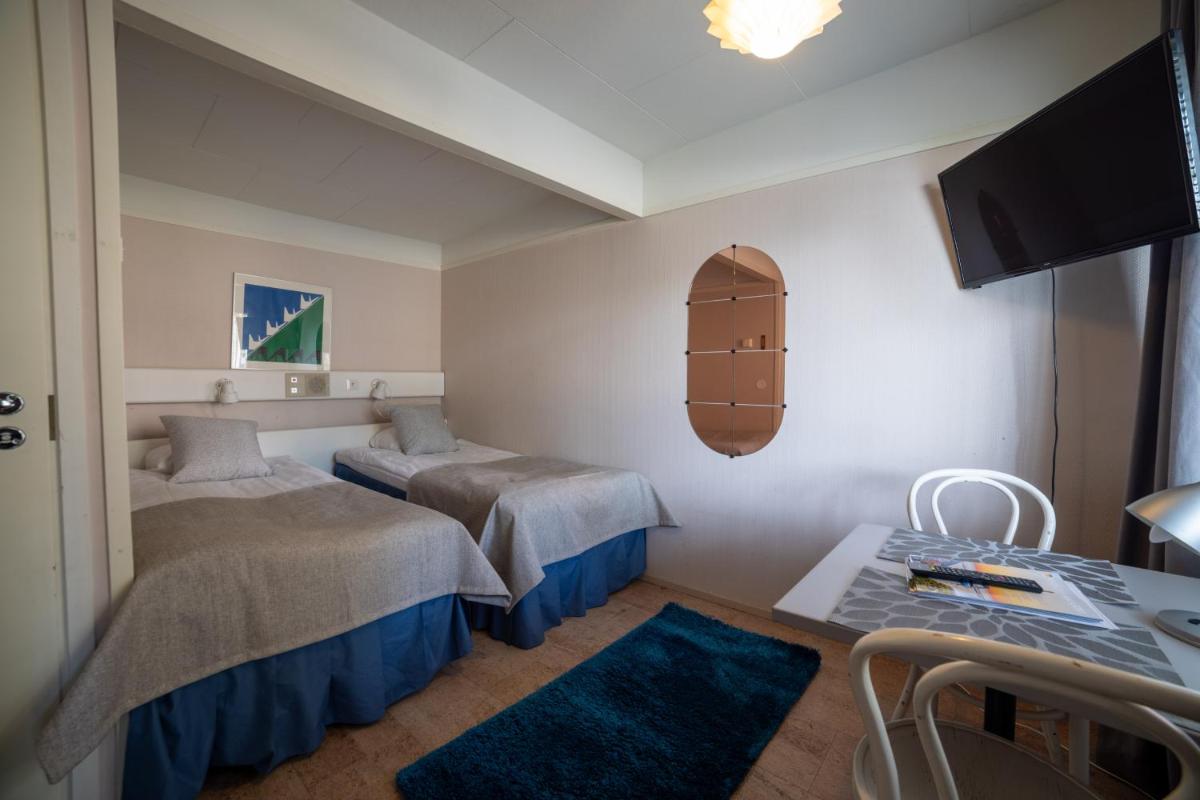 Rantakallan Rinne rivitalohuoneet - Housity