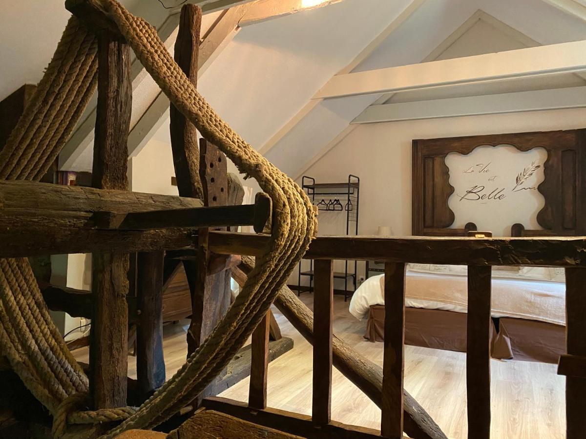 Un ou plusieurs lits dans un hébergement de l'établissement Les Moulins Du Duc ÉCOLODGE