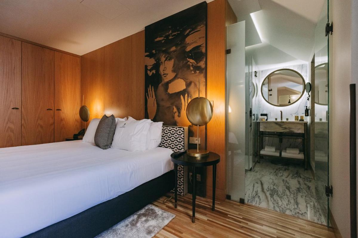 Uma cama ou camas num quarto em Torel Avantgarde