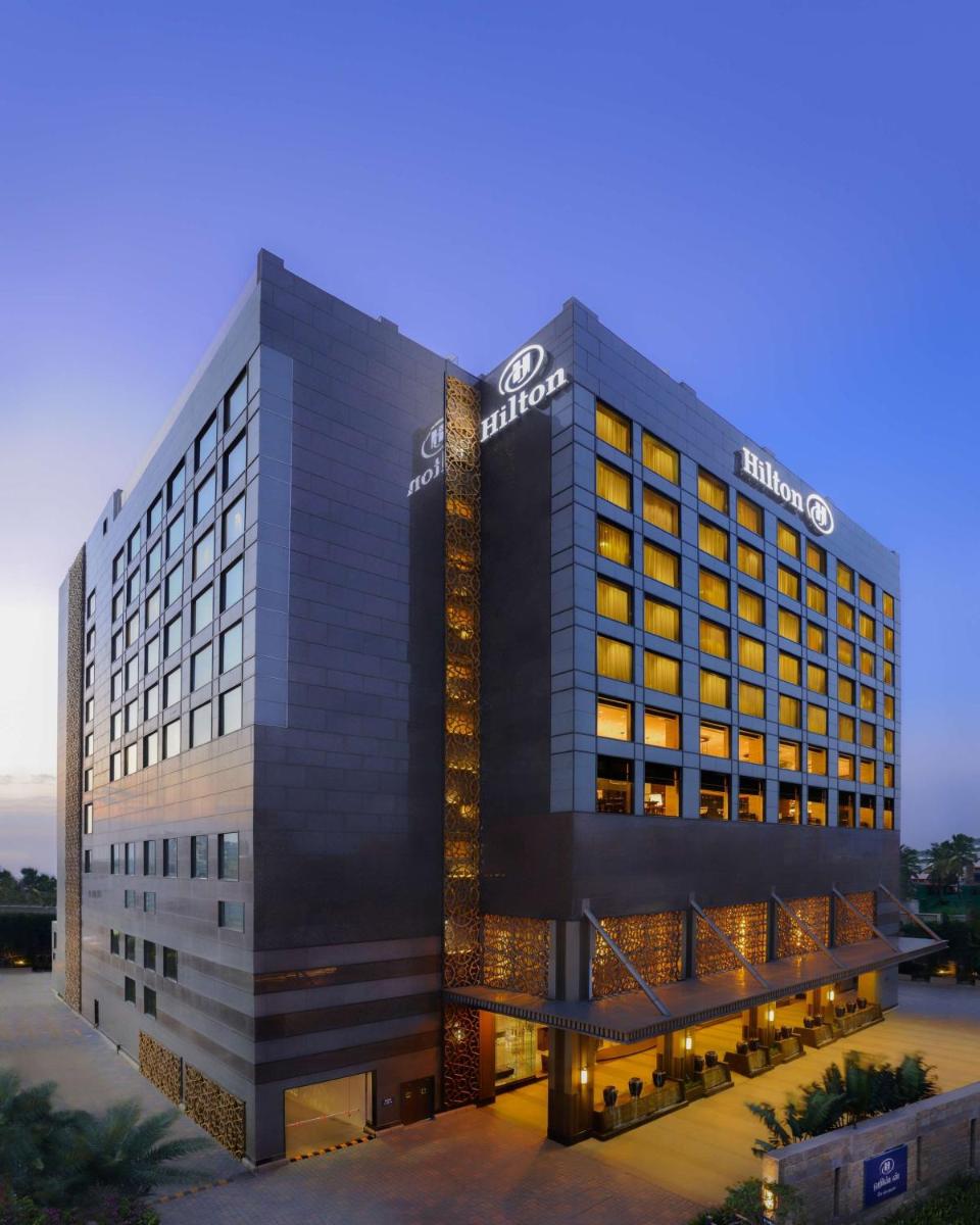 a rendering of the sutton condominium building at Hilton Chennai in Chennai