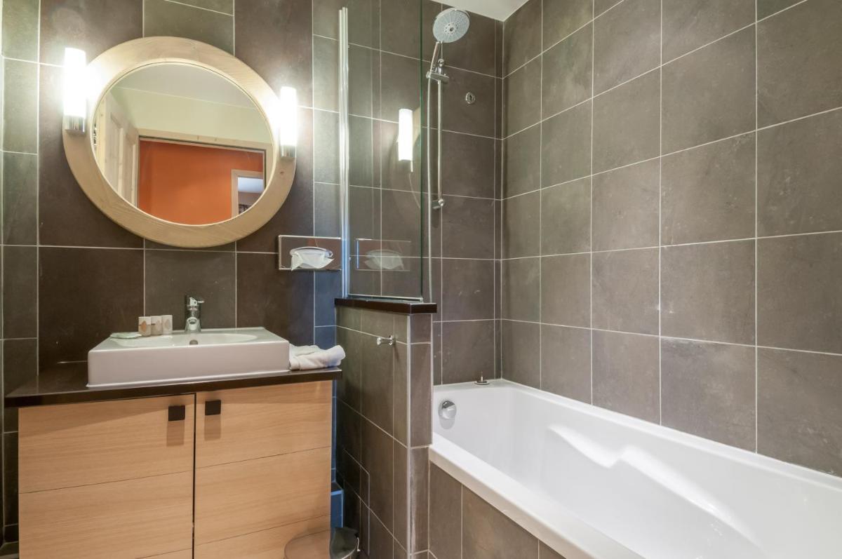 Salle de bains dans l'établissement Résidence Pierre & Vacances Premium L'Amara