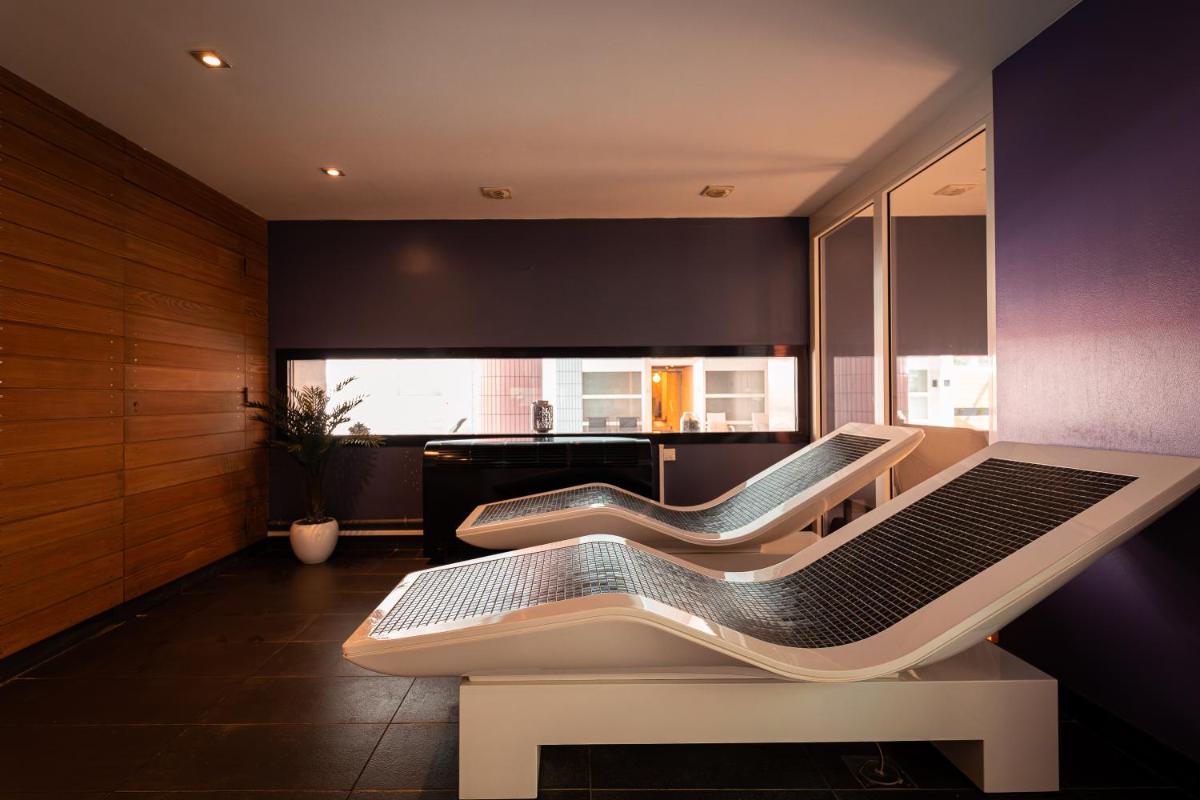 Coin salon dans l'établissement Hôtel Diana Restaurant & Spa by HappyCulture
