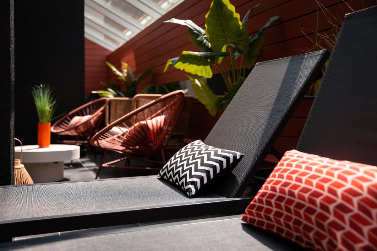 Coin salon dans l'établissement Hôtel Diana Restaurant & Spa by HappyCulture