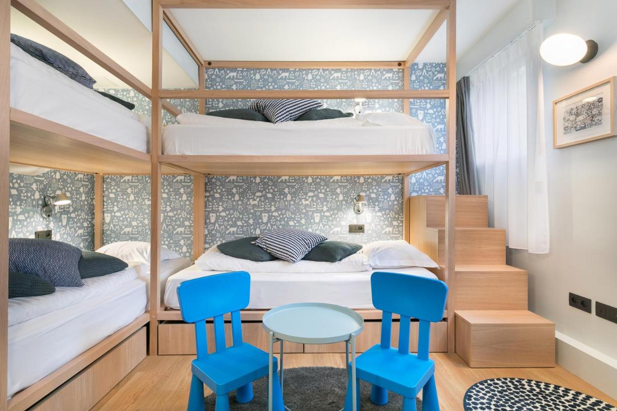 Un ou plusieurs lits dans un hébergement de l'établissement Hôtel Diana Restaurant & Spa by HappyCulture