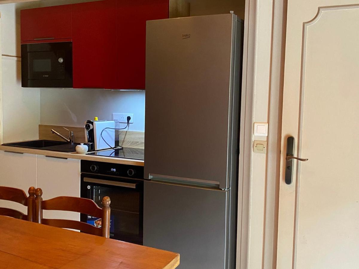Cuisine ou kitchenette dans l'établissement Les Moulins Du Duc ÉCOLODGE