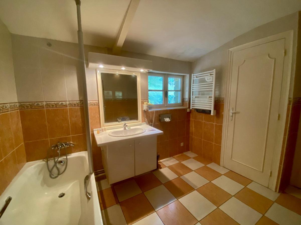 Salle de bains dans l'établissement Les Moulins Du Duc ÉCOLODGE