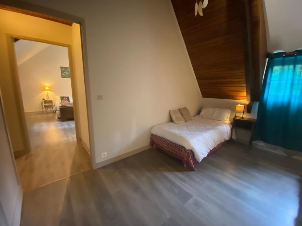 Un ou plusieurs lits dans un hébergement de l'établissement Les Moulins Du Duc ÉCOLODGE