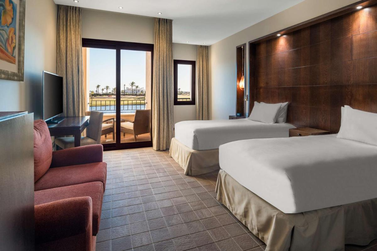 Cama o camas de una habitación en Doubletree By Hilton La Torre Golf Resort