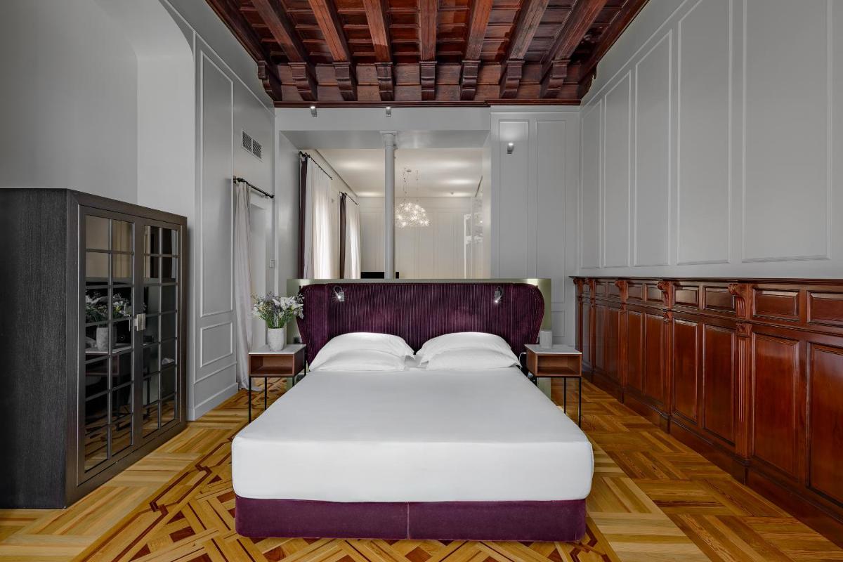Cama o camas de una habitación en CoolRooms Palacio Villapanés 5 GL