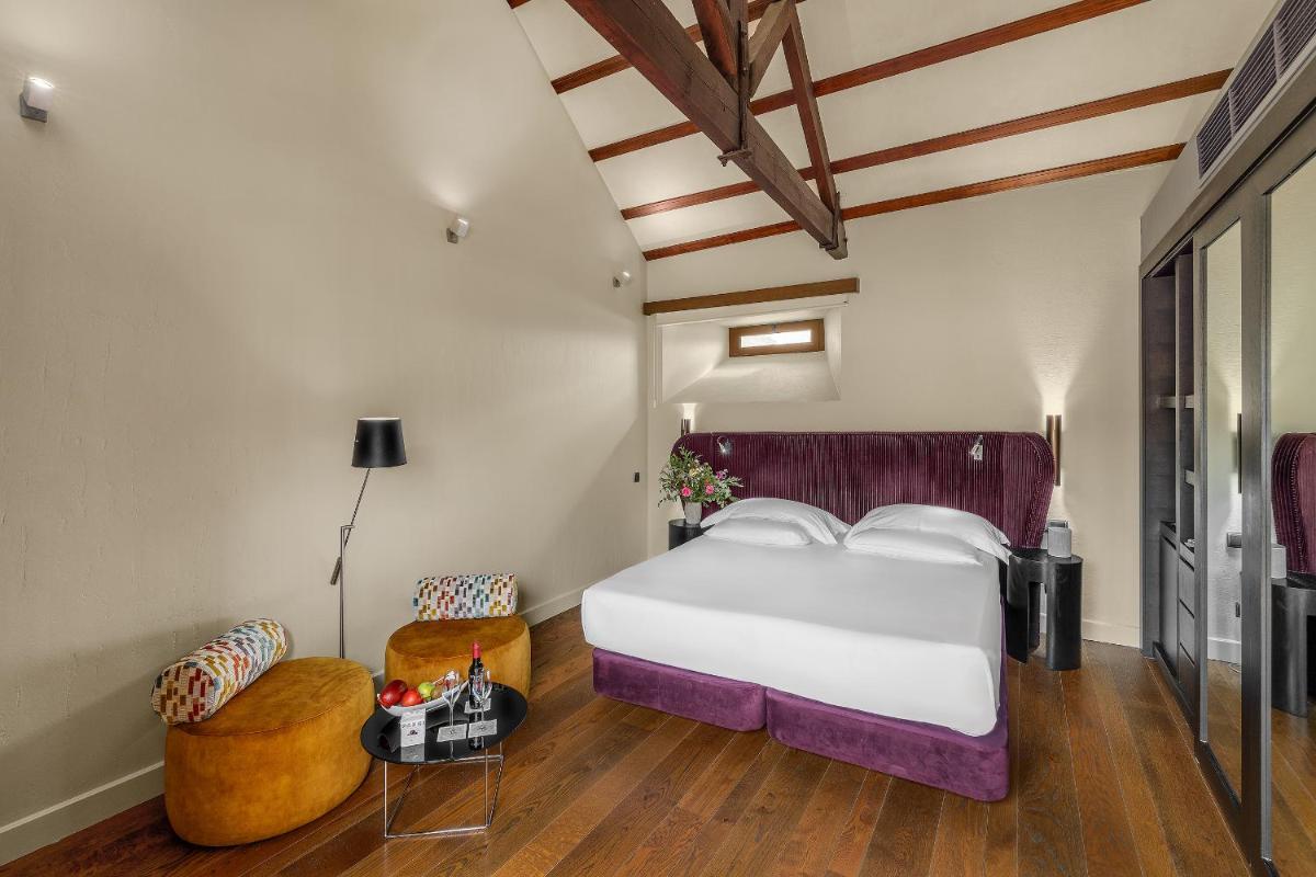 Cama o camas de una habitación en CoolRooms Palacio Villapanés 5 GL