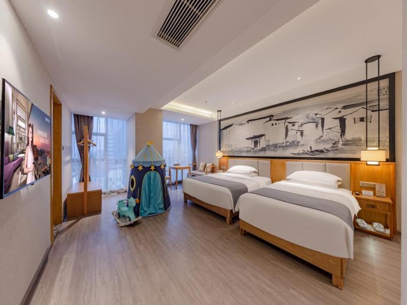 GreenTree Eastern Hotel Jiaxing Haining Leather City Nanguanxiang - Housity