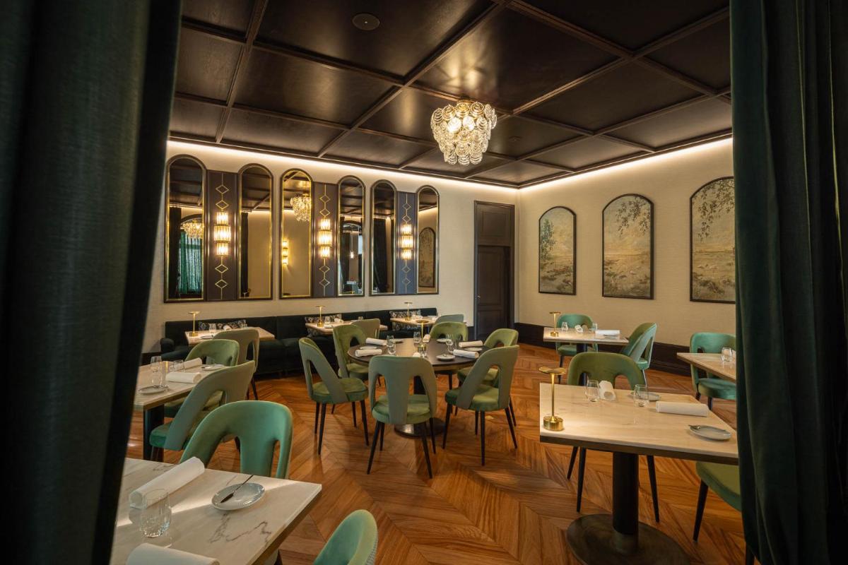 Um restaurante ou outro lugar para comer em MS Collection Aveiro - Palacete Valdemouro
