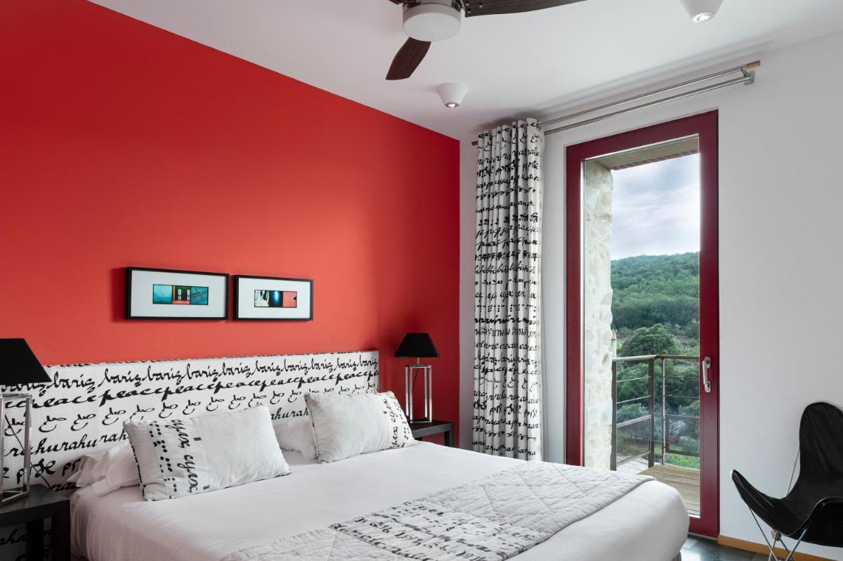 Un ou plusieurs lits dans un hébergement de l'établissement Domaine Riberach - Hotel 4 - Restaurant gastronomique - Spa - Piscine - Vignoble