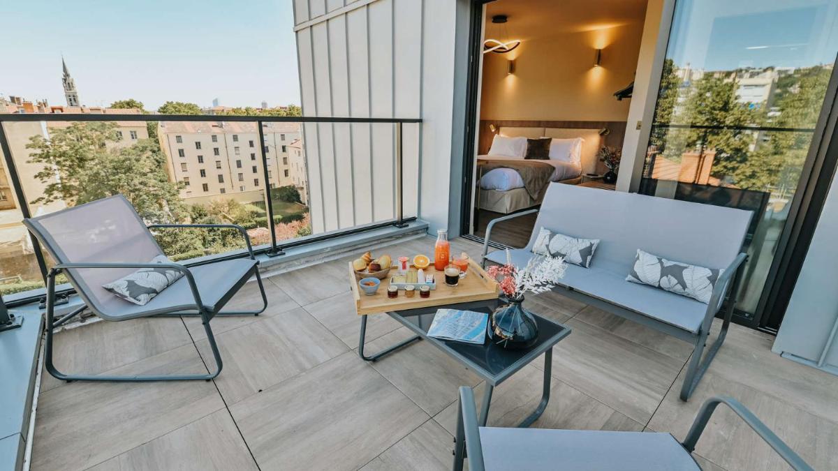 Balcon ou terrasse dans l'établissement Keystone Hôtel & Spa