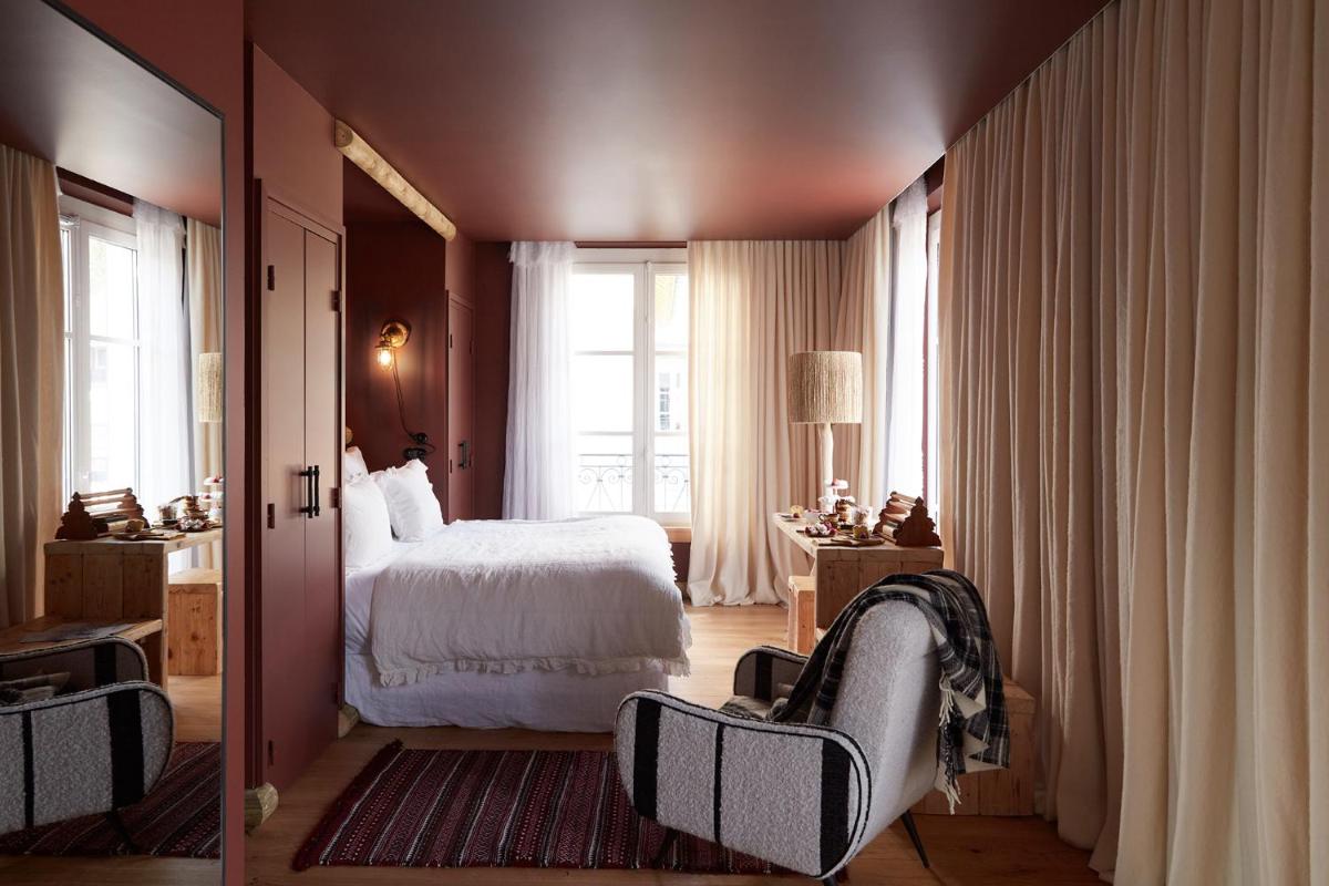 Un ou plusieurs lits dans un hébergement de l'établissement Grand Hotel Soleil d'Or
