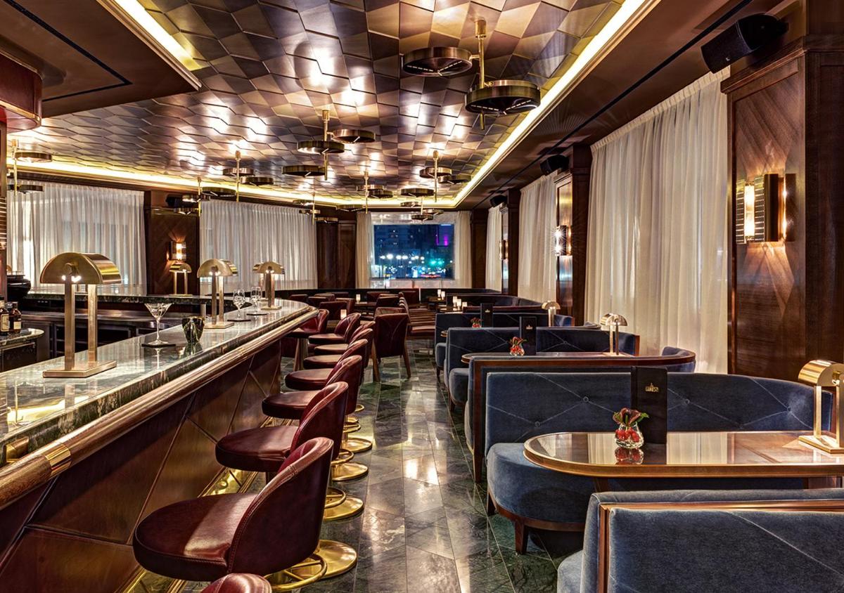 Ein Sitzbereich in der Unterkunft Waldorf Astoria Berlin