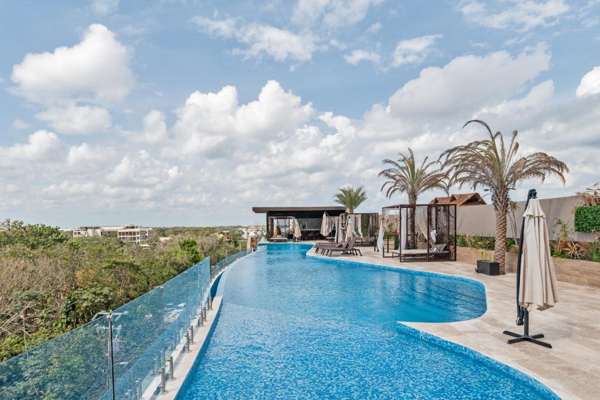Menesse Tulum Luxury Apartments by Spot Rentals - Housity