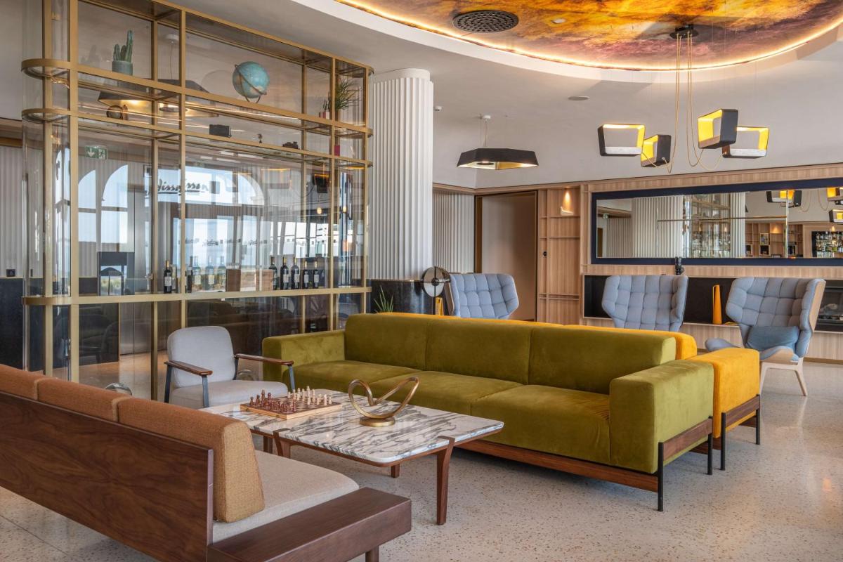 Coin salon dans l'établissement Radisson Blu Grand Hotel & Spa, Malo-Les-Bains