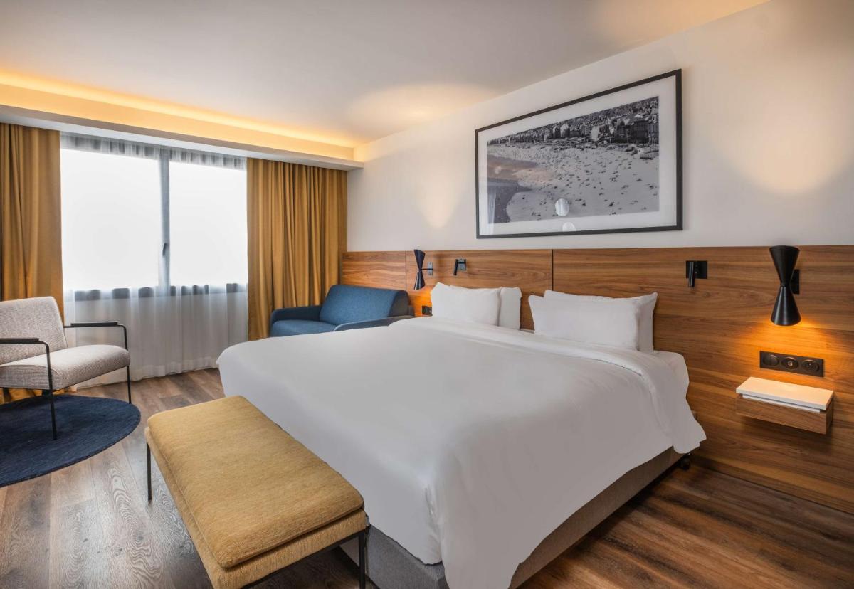 Un ou plusieurs lits dans un hébergement de l'établissement Radisson Blu Grand Hotel & Spa, Malo-Les-Bains