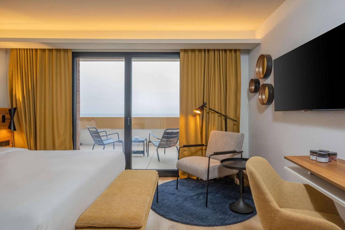 Un ou plusieurs lits dans un hébergement de l'établissement Radisson Blu Grand Hotel & Spa, Malo-Les-Bains