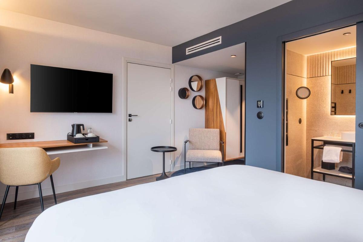 Un ou plusieurs lits dans un hébergement de l'établissement Radisson Blu Grand Hotel & Spa, Malo-Les-Bains