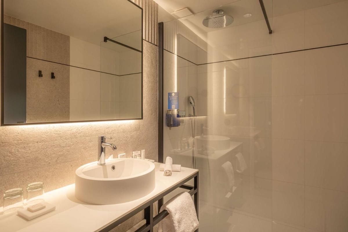 Salle de bains dans l'établissement Radisson Blu Grand Hotel & Spa, Malo-Les-Bains
