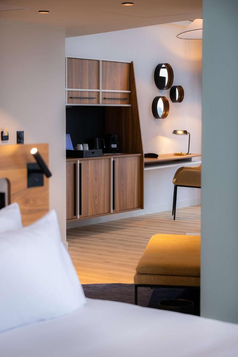 Un ou plusieurs lits dans un hébergement de l'établissement Radisson Blu Grand Hotel & Spa, Malo-Les-Bains