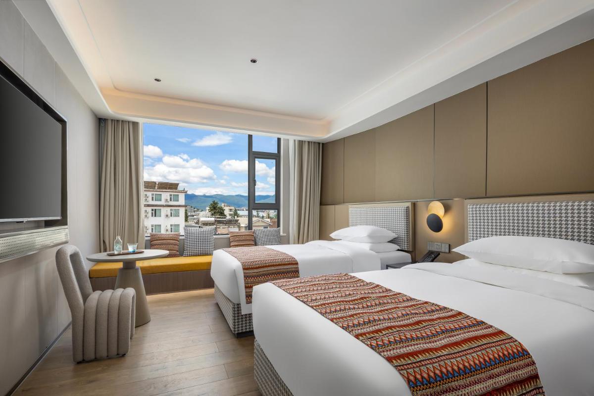kasion purey Designer Hotel - Lijiang Ancient City Sifang Street - Housity