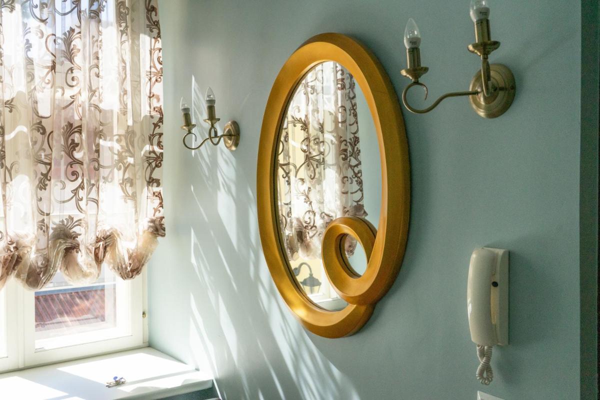 A lovely apartment at the heart of Tallinn Old Town - Housity
