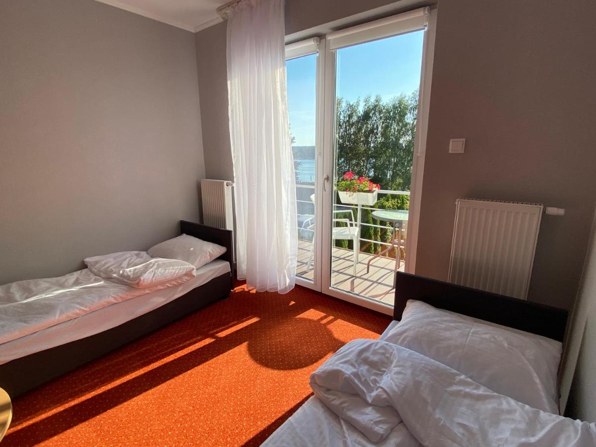 Hotelik Likusy - przy pla?y nad jeziorem Ukiel i z bezp?atnym prywatnym parkingiem - Housity