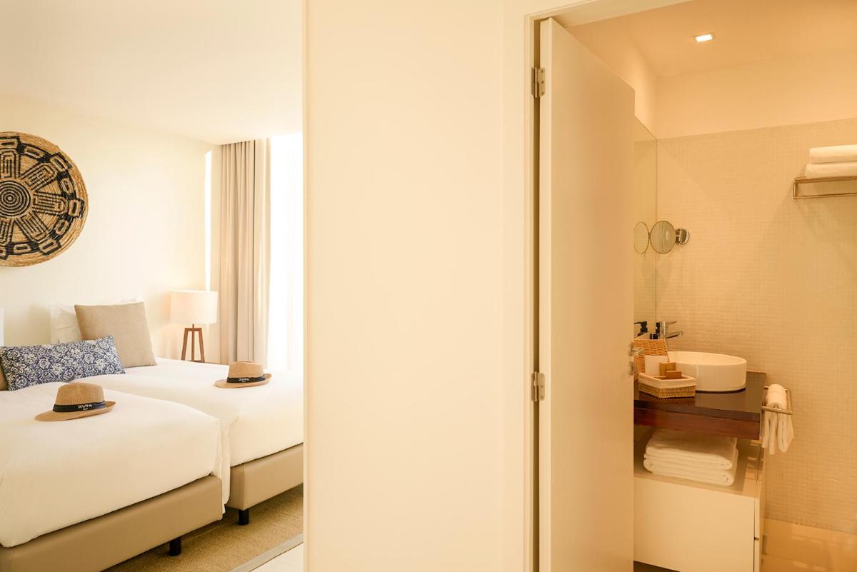 Uma cama ou camas num quarto em Octant Evora