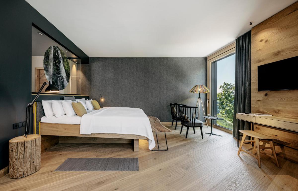 Ein Bett oder Betten in einem Zimmer der Unterkunft Luisenhöhe - Gesundheitsresort Schwarzwald