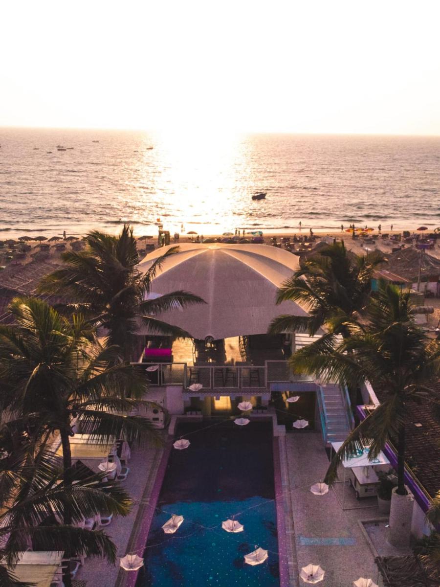 an aerial view of a resort with a swimming pool and a beach at The Park Calangute Goa in Calangute an aerial view of a resort with a swimming pool and a beach at The Park Calangute Goa in Calangute