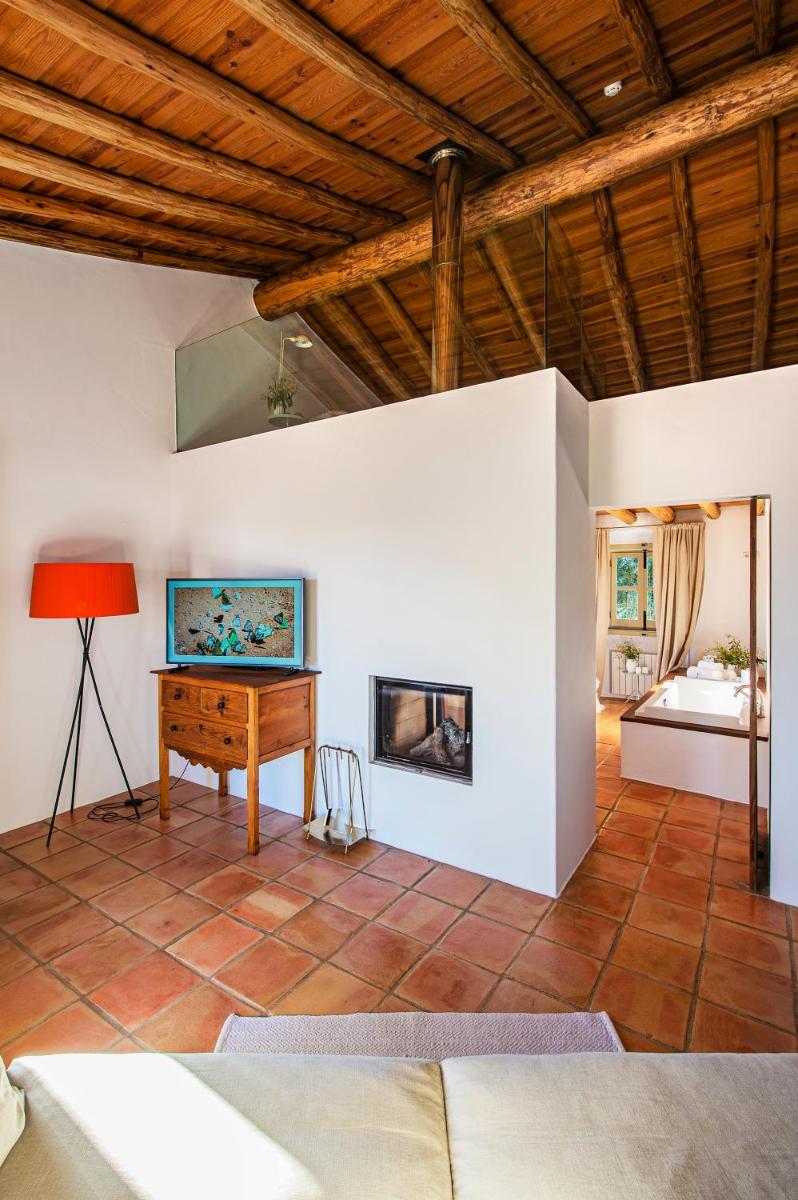 Uma cama ou camas num quarto em Herdade da Malhadinha Nova - Relais & Châteaux