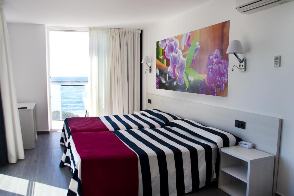 Cama o camas de una habitación en Hotel Europa Splash & Spa