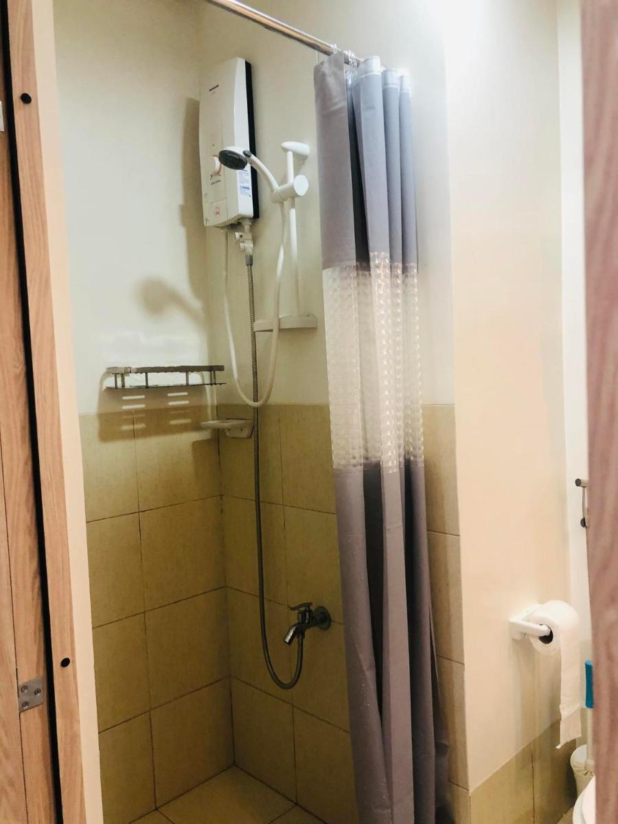 Osam Empire Suites 2BR Staycation at Trees Residences Condominium - Housity