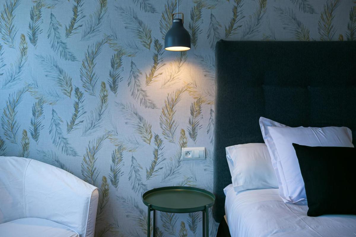 Cama o camas de una habitación en Hotel Spa Sinagoga