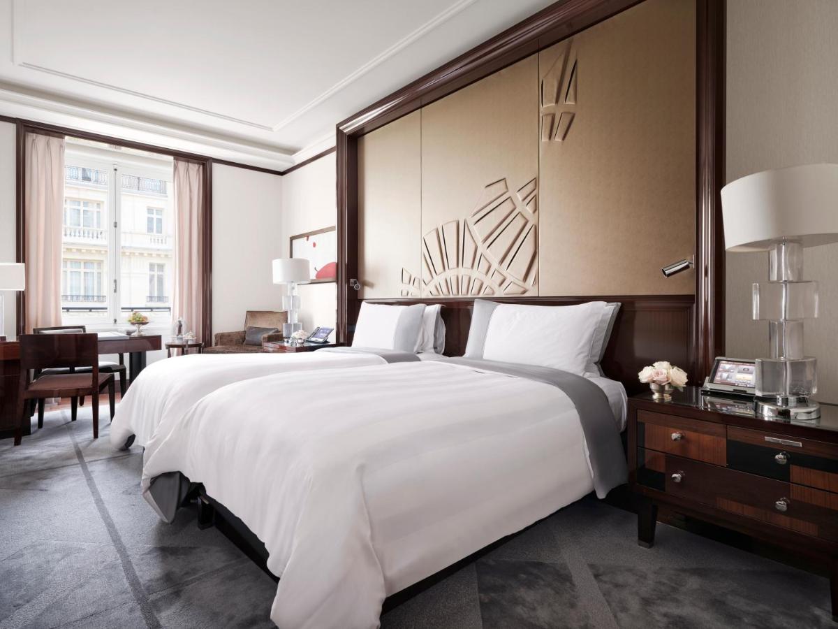 Un ou plusieurs lits dans un hébergement de l'établissement The Peninsula Paris