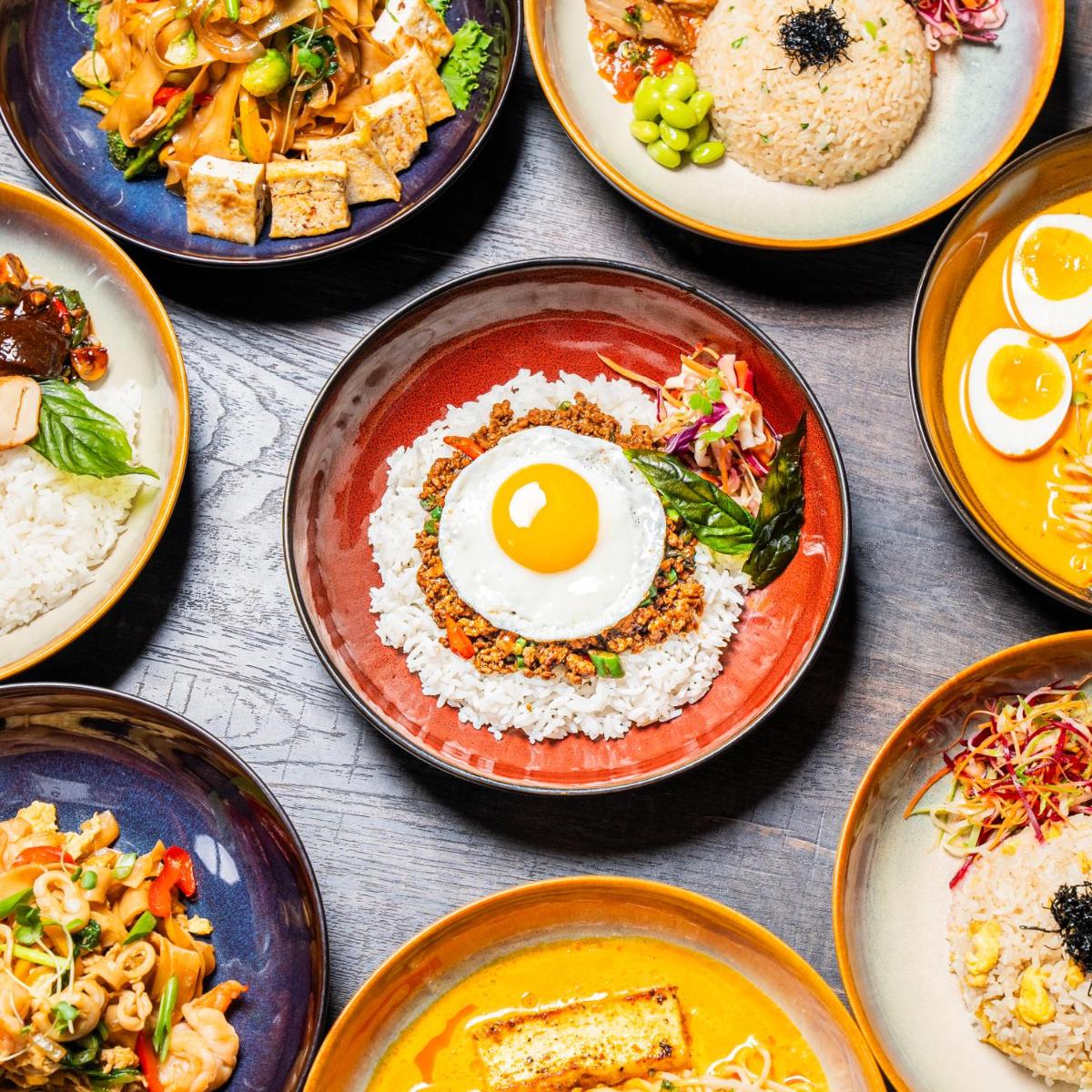 a group of plates of food on a table at Sheraton Hyderabad Hotel in Hyderabad