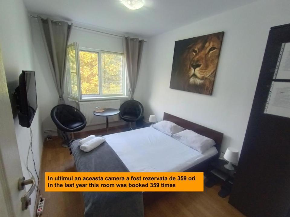 Hostel Florentin camere b?i comune acces bucatarie Cheap rooms Smart TV Netflix Constanta kitchen and laundry machine acces fast wifi - Housity