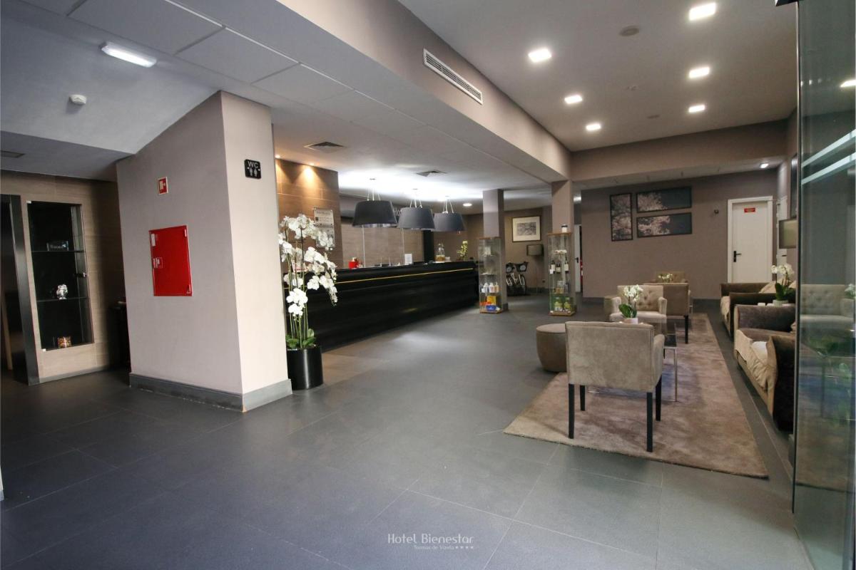 Uma área de estar em Hotel Bienestar Termas De Vizela