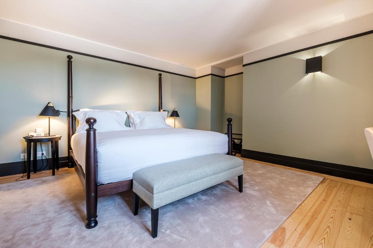 Uma cama ou camas num quarto em Octant Lousa