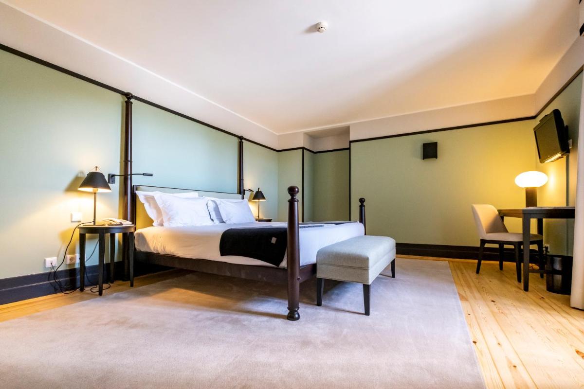 Uma cama ou camas num quarto em Octant Lousa